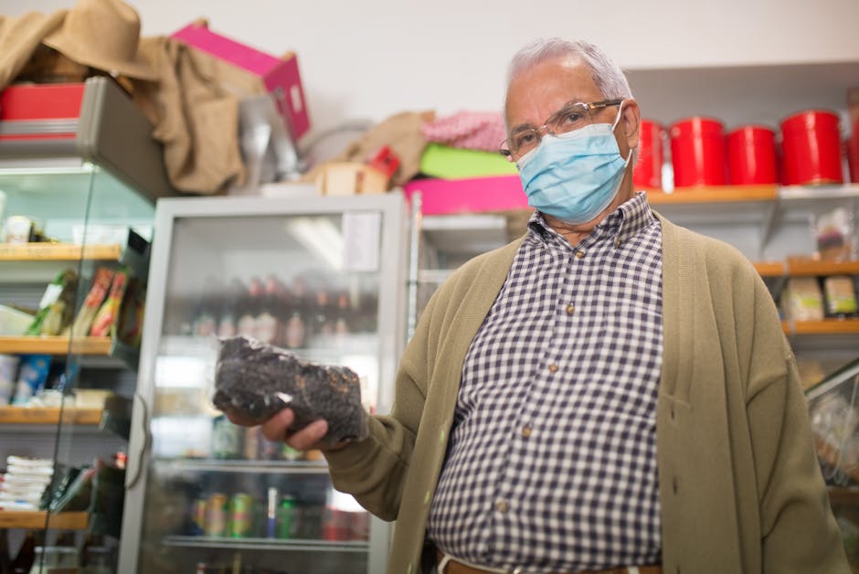 Small retail shopkeeper managing inventory